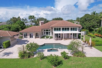 NEARLY ONE ACRE LOT! Breathtaking lakefront beauty is showcased on Frenchmans Creek Country Club in Florida - for sale on GolfHomes.com, golf home, golf lot