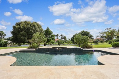 NEARLY ONE ACRE LOT! Breathtaking lakefront beauty is showcased on Frenchmans Creek Country Club in Florida - for sale on GolfHomes.com, golf home, golf lot