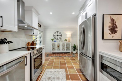 This exceptional residence has been completely reimagined with a on Hunters Run Golf and Country Club in Florida - for sale on GolfHomes.com, golf home, golf lot