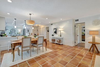 This exceptional residence has been completely reimagined with a on Hunters Run Golf and Country Club in Florida - for sale on GolfHomes.com, golf home, golf lot