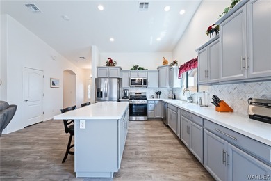 Welcome to this beautifully maintained 3-bedroom, 2-bath POOL on Desert Lakes Golf Course in Arizona - for sale on GolfHomes.com, golf home, golf lot