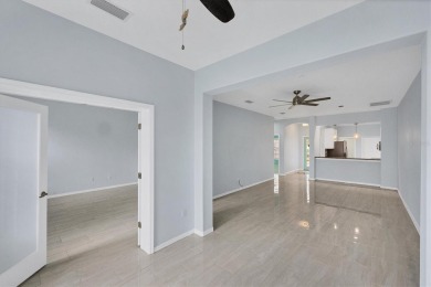 Come and See!  Updated villa has 2BD/2BA plus space for on Pelican Pointe Golf and Country Club in Florida - for sale on GolfHomes.com, golf home, golf lot