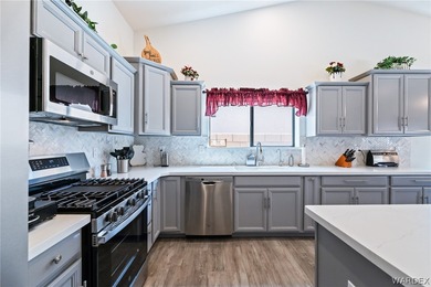 Welcome to this beautifully maintained 3-bedroom, 2-bath POOL on Desert Lakes Golf Course in Arizona - for sale on GolfHomes.com, golf home, golf lot