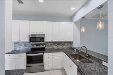 Come and See!  Updated villa has 2BD/2BA plus space for on Pelican Pointe Golf and Country Club in Florida - for sale on GolfHomes.com, golf home, golf lot