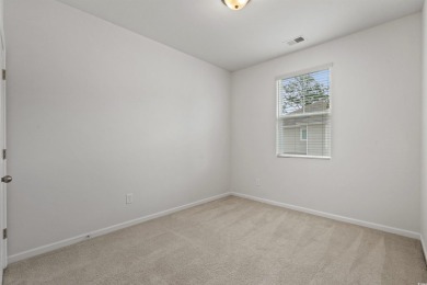 This home comes with a rare financing advantage: an assumable on Myrtlewood Golf Course and Club  in South Carolina - for sale on GolfHomes.com, golf home, golf lot