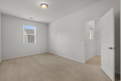 This home comes with a rare financing advantage: an assumable on Myrtlewood Golf Course and Club  in South Carolina - for sale on GolfHomes.com, golf home, golf lot