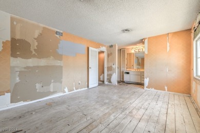 Attention Investors! This property is a complete fixer-upper on Las Vegas National Golf Club in Nevada - for sale on GolfHomes.com, golf home, golf lot