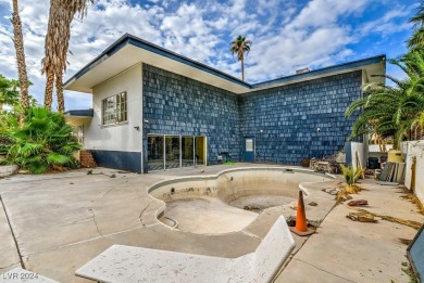 Attention Investors! This property is a complete fixer-upper on Las Vegas National Golf Club in Nevada - for sale on GolfHomes.com, golf home, golf lot