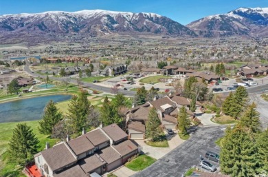 Situated against the ninth hole of the Wolf Creek golf course on Wolf Creek Golf Club and Resort in Utah - for sale on GolfHomes.com, golf home, golf lot