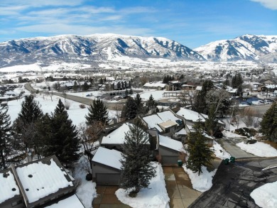 Situated against the ninth hole of the Wolf Creek golf course on Wolf Creek Golf Club and Resort in Utah - for sale on GolfHomes.com, golf home, golf lot