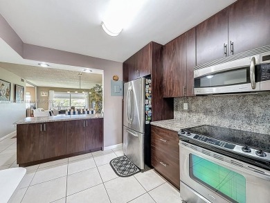 This charming 2-bed, 2-bath home features tile floors, neutral on Hollybrook Golf and Tennis Club  in Florida - for sale on GolfHomes.com, golf home, golf lot