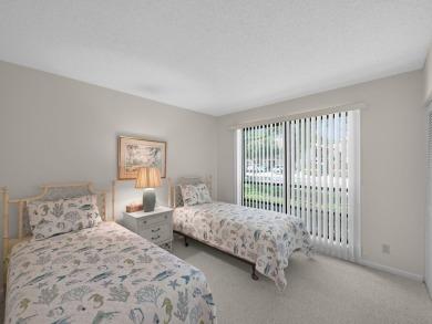 Very Rare Waterfront 1st Floor Condo: Enjoy the peaceful on PGA National Golf Club in Florida - for sale on GolfHomes.com, golf home, golf lot