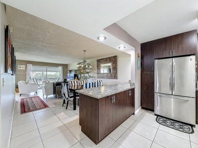 This charming 2-bed, 2-bath home features tile floors, neutral on Hollybrook Golf and Tennis Club  in Florida - for sale on GolfHomes.com, golf home, golf lot