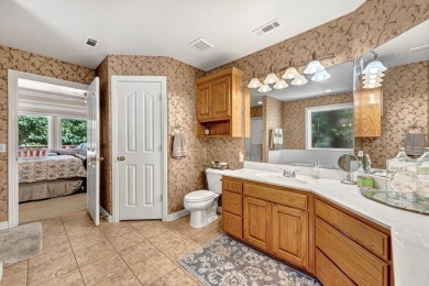 A stunning residence nestled on Dogwood golf course in Bella on Bella Vista - Metfield Golf Complex and Country Club in Arkansas - for sale on GolfHomes.com, golf home, golf lot
