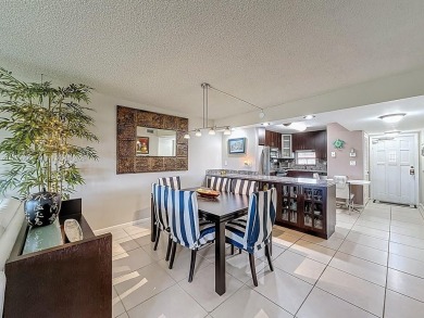 This charming 2-bed, 2-bath home features tile floors, neutral on Hollybrook Golf and Tennis Club  in Florida - for sale on GolfHomes.com, golf home, golf lot