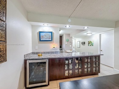 This charming 2-bed, 2-bath home features tile floors, neutral on Hollybrook Golf and Tennis Club  in Florida - for sale on GolfHomes.com, golf home, golf lot