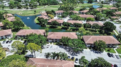 Very Rare Waterfront 1st Floor Condo: Enjoy the peaceful on PGA National Golf Club in Florida - for sale on GolfHomes.com, golf home, golf lot