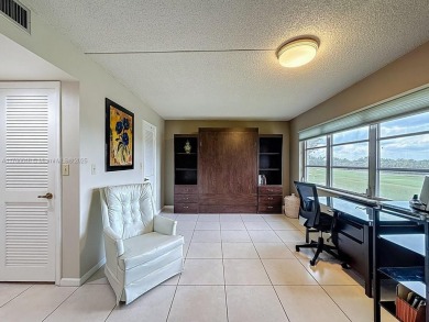 This charming 2-bed, 2-bath home features tile floors, neutral on Hollybrook Golf and Tennis Club  in Florida - for sale on GolfHomes.com, golf home, golf lot
