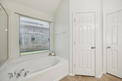Welcome to this beautifully maintained 3-bed, 2-bath home in the on The Golf Club At Champions Circle in Texas - for sale on GolfHomes.com, golf home, golf lot
