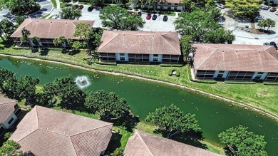 Very Rare Waterfront 1st Floor Condo: Enjoy the peaceful on PGA National Golf Club in Florida - for sale on GolfHomes.com, golf home, golf lot