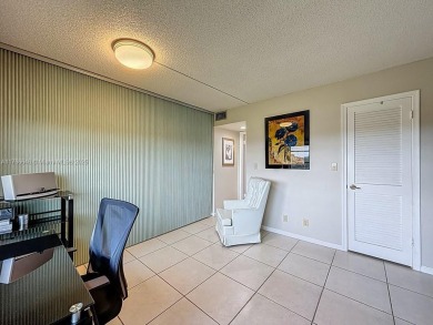 This charming 2-bed, 2-bath home features tile floors, neutral on Hollybrook Golf and Tennis Club  in Florida - for sale on GolfHomes.com, golf home, golf lot