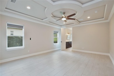 Discover the epitome of elegance and comfort in this on Kings Ridge Golf Club in Florida - for sale on GolfHomes.com, golf home, golf lot