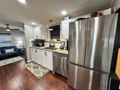 GREAT BUY ~ SAVE $10,000! Welcome "home" to this on Four Lakes Golf Club in Florida - for sale on GolfHomes.com, golf home, golf lot
