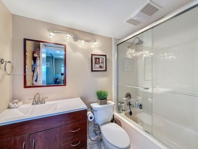 This charming 2-bed, 2-bath home features tile floors, neutral on Hollybrook Golf and Tennis Club  in Florida - for sale on GolfHomes.com, golf home, golf lot