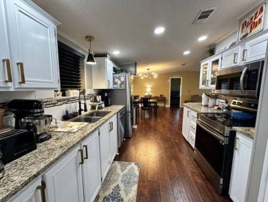 GREAT BUY ~ SAVE $10,000! Welcome "home" to this on Four Lakes Golf Club in Florida - for sale on GolfHomes.com, golf home, golf lot