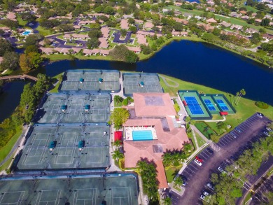 Very Rare Waterfront 1st Floor Condo: Enjoy the peaceful on PGA National Golf Club in Florida - for sale on GolfHomes.com, golf home, golf lot