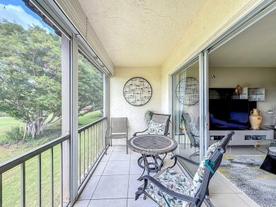 This charming 2-bed, 2-bath home features tile floors, neutral on Hollybrook Golf and Tennis Club  in Florida - for sale on GolfHomes.com, golf home, golf lot