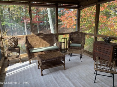 Mountain and golf course views make this light filled open floor on Buck Hill Golf Club  in Pennsylvania - for sale on GolfHomes.com, golf home, golf lot