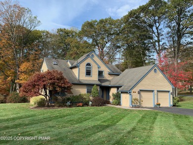Mountain and golf course views make this light filled open floor on Buck Hill Golf Club  in Pennsylvania - for sale on GolfHomes.com, golf home, golf lot