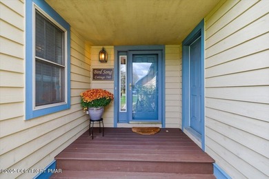 Mountain and golf course views make this light filled open floor on Buck Hill Golf Club  in Pennsylvania - for sale on GolfHomes.com, golf home, golf lot