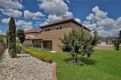 Discover the epitome of elegance and comfort in this on Kings Ridge Golf Club in Florida - for sale on GolfHomes.com, golf home, golf lot