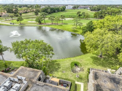 Unmatched, spectacular views of the lake and golf course await on PGA National Golf Club in Florida - for sale on GolfHomes.com, golf home, golf lot