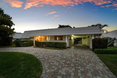 Welcome home to this charming 2-bedroom, 2-bath single-family on Atlantis Golf Club in Florida - for sale on GolfHomes.com, golf home, golf lot