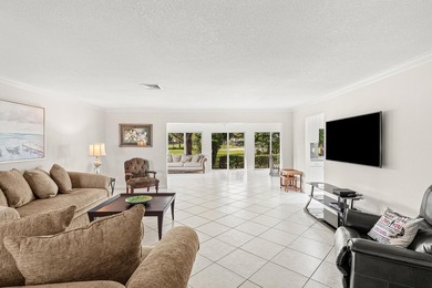 Welcome home to this charming 2-bedroom, 2-bath single-family on Atlantis Golf Club in Florida - for sale on GolfHomes.com, golf home, golf lot