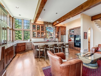 Craftsman-style Iron Horse residence perched above the 14th hole on Iron Horse Golf Club in Montana - for sale on GolfHomes.com, golf home, golf lot