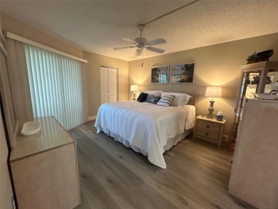 Welcome to your slice of paradise in this first-floor 2-bedroom on IMG Academies Golf and Country Club in Florida - for sale on GolfHomes.com, golf home, golf lot