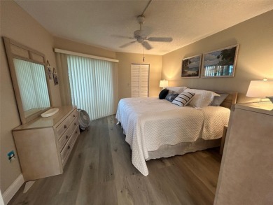 Welcome to your slice of paradise in this first-floor 2-bedroom on IMG Academies Golf and Country Club in Florida - for sale on GolfHomes.com, golf home, golf lot