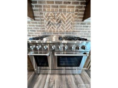 Inviting, desirable, light-filled home is immaculate and move-in on Sage Lakes Municipal Golf Course in Idaho - for sale on GolfHomes.com, golf home, golf lot