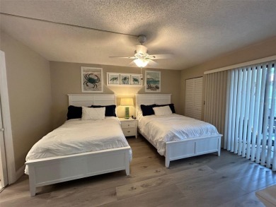 Welcome to your slice of paradise in this first-floor 2-bedroom on IMG Academies Golf and Country Club in Florida - for sale on GolfHomes.com, golf home, golf lot