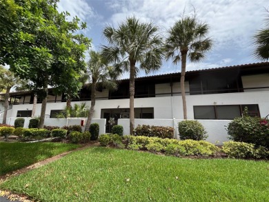 Welcome to your slice of paradise in this first-floor 2-bedroom on IMG Academies Golf and Country Club in Florida - for sale on GolfHomes.com, golf home, golf lot