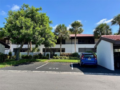 Welcome to your slice of paradise in this first-floor 2-bedroom on IMG Academies Golf and Country Club in Florida - for sale on GolfHomes.com, golf home, golf lot