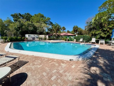 Welcome to your slice of paradise in this first-floor 2-bedroom on IMG Academies Golf and Country Club in Florida - for sale on GolfHomes.com, golf home, golf lot