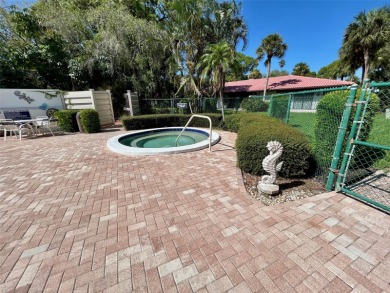 Welcome to your slice of paradise in this first-floor 2-bedroom on IMG Academies Golf and Country Club in Florida - for sale on GolfHomes.com, golf home, golf lot