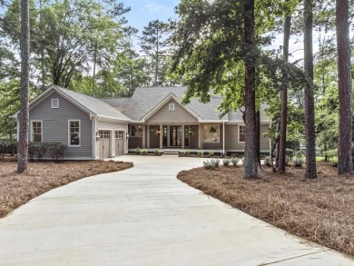 Situated on a large, flat property, this expansive, newly on Reynolds Lake Oconee - The Preserve in Georgia - for sale on GolfHomes.com, golf home, golf lot