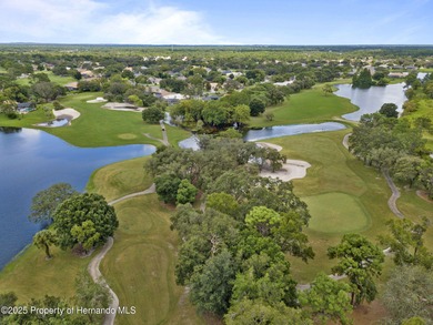 Now offered at an improved Price!! Beautiful family home in the on Glen Lakes Country Club in Florida - for sale on GolfHomes.com, golf home, golf lot