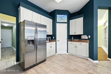 This beautiful brick home is ideal for multi-generational living on Windsor Parke Golf Club in Florida - for sale on GolfHomes.com, golf home, golf lot